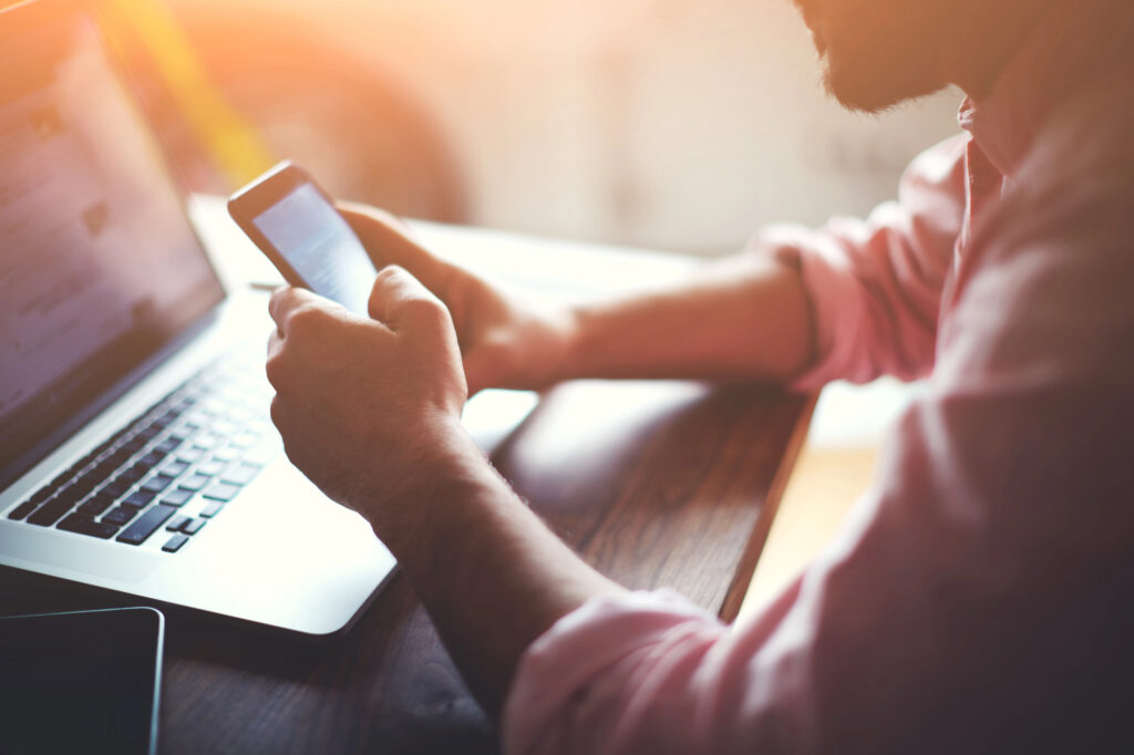 Person searches on their phone for an uncontested divorce lawyer